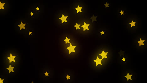 animation of glowing golden stars twinkling and moving in hypnotic motion on black background