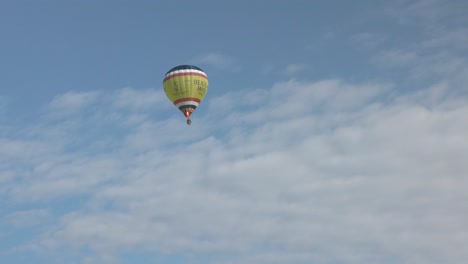 tracking shot of the Headlands Hotel hot air balloon flying over Newquay