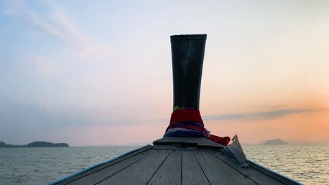 landscape of the head front of local boat while sailing in sea ocean in early morning time