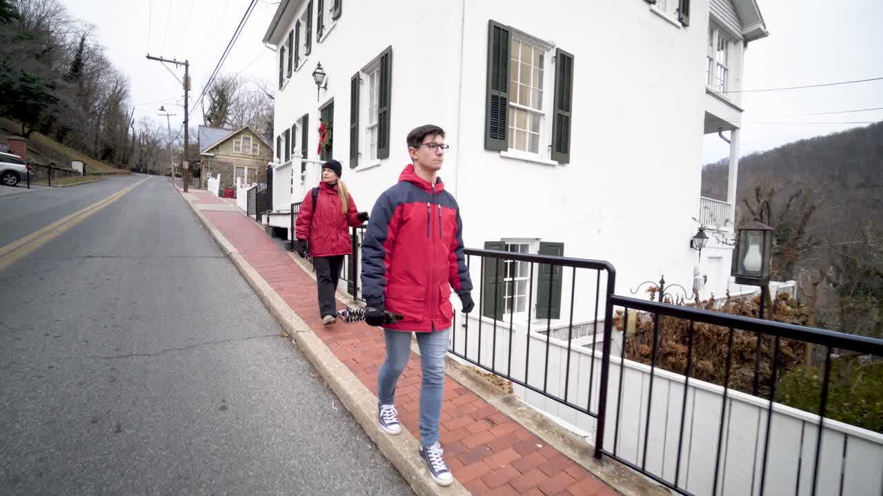 People walking on a street in a town