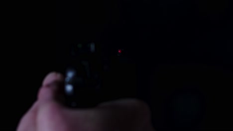 point of view of 9mm pistol firing multiple times until it is empty in a dark room