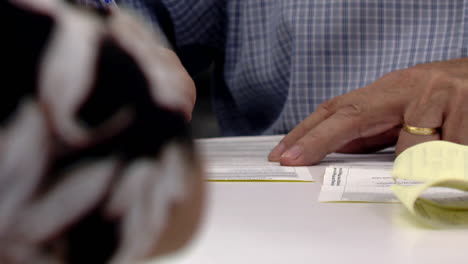 person filling out documents