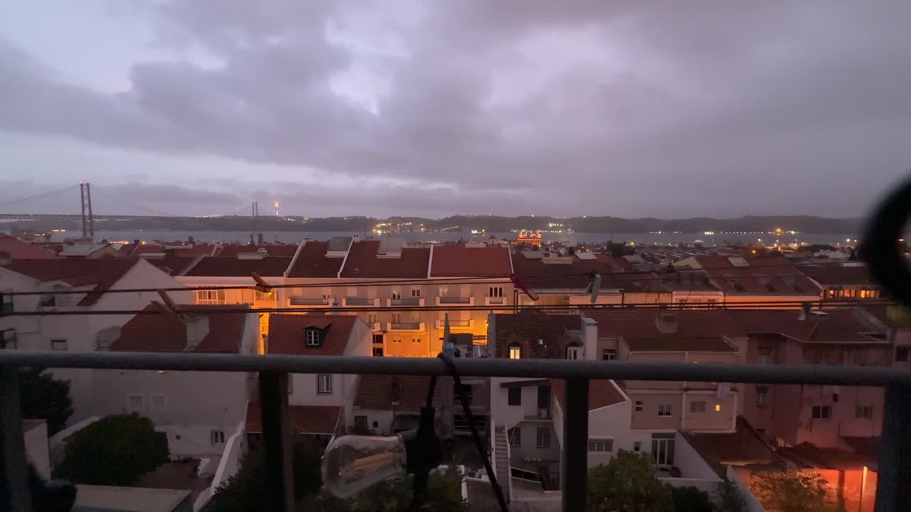 Nighttime Cityscape with Bridge