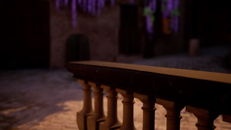 a stone balcony with wisteria vines