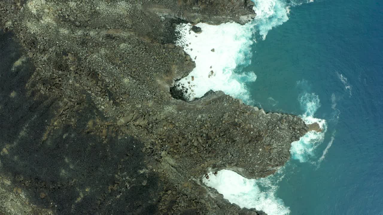 Fan shaped rocky tendrils of San Benedicto Revillagigedo Islands Mexico, aerial top down