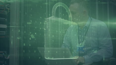 animation of cyber attack text and padlock over caucasian male it technician with laptop