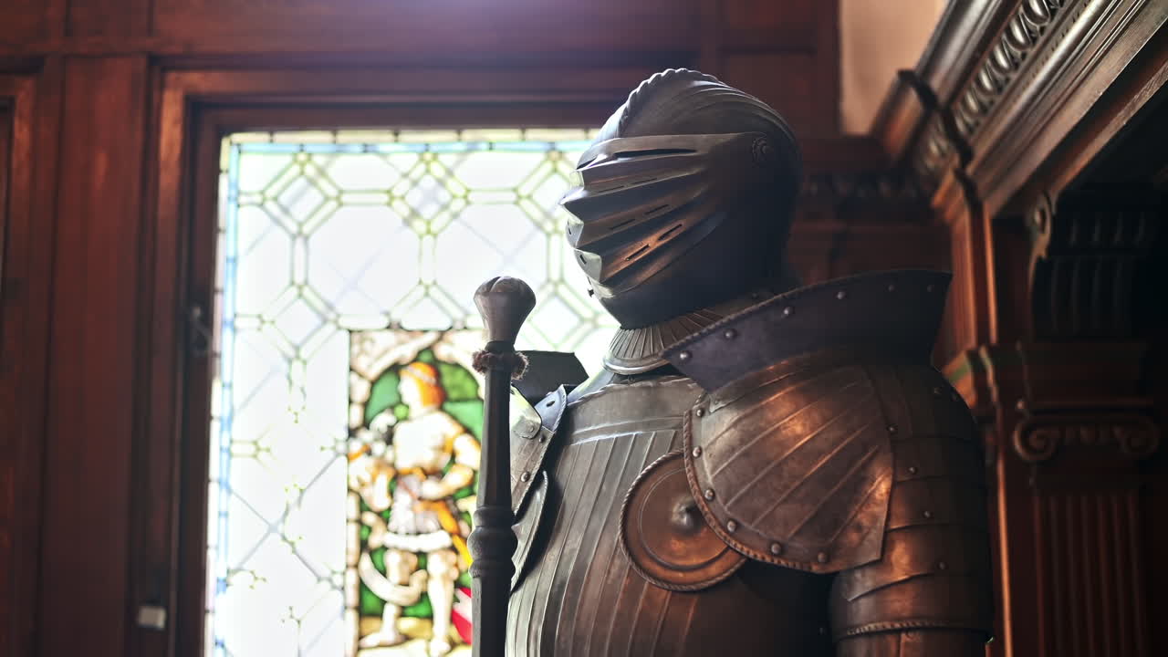 Peles Castle interior in Romania. A room with a statue of a knight and a classic design