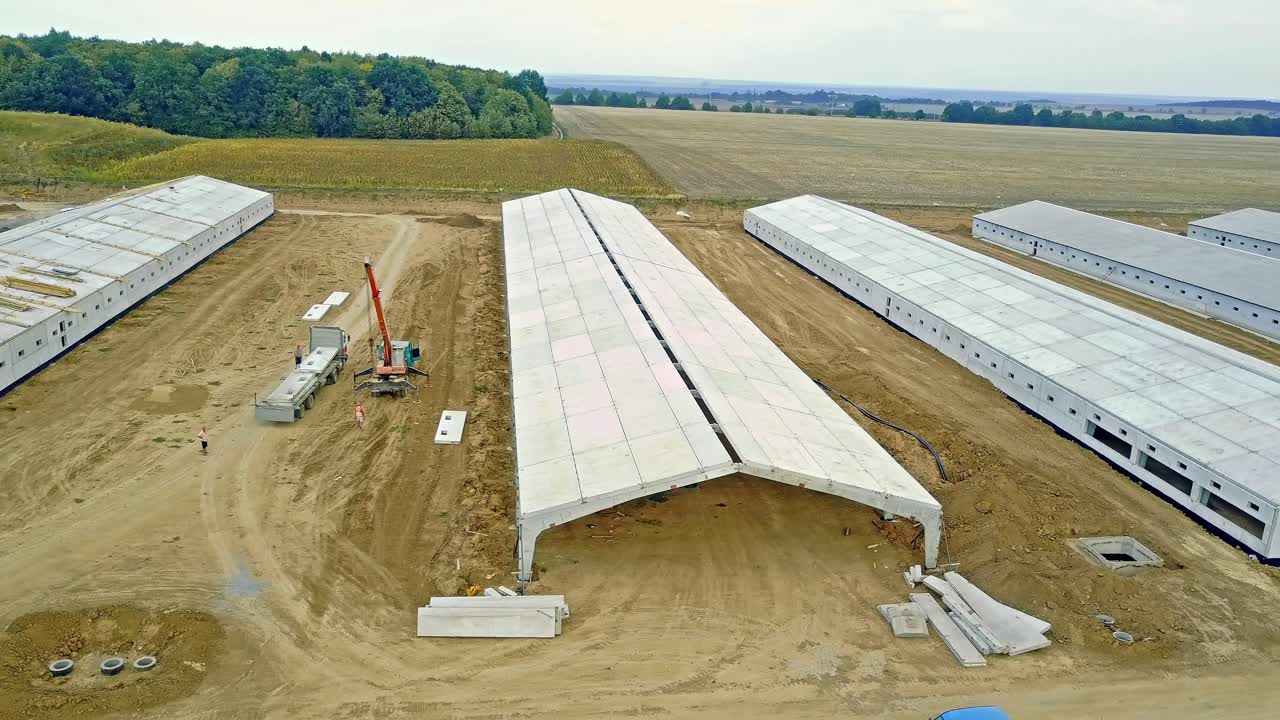 Farm construction in progress. New future building farm for livestock