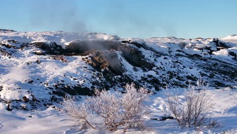 geothermal field in iceland, near myvatn lake, releasing gases from volcanic activity, pan