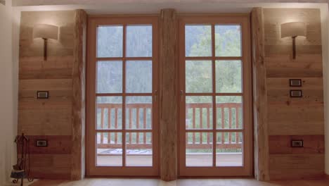 Stunning-Shot-Of-Outdoor-Green-Landscape-Through-Wooden-Door-Balcony