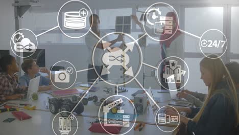 Animation-of-network-of-digital-icons-over-diverse-man-and-woman-showing-their-product-at-office