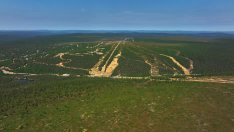 Aerial-view-toward-the-Kaunispaa-fell-and-the-slopes-of-Saariselka,-summer-in-Lapland