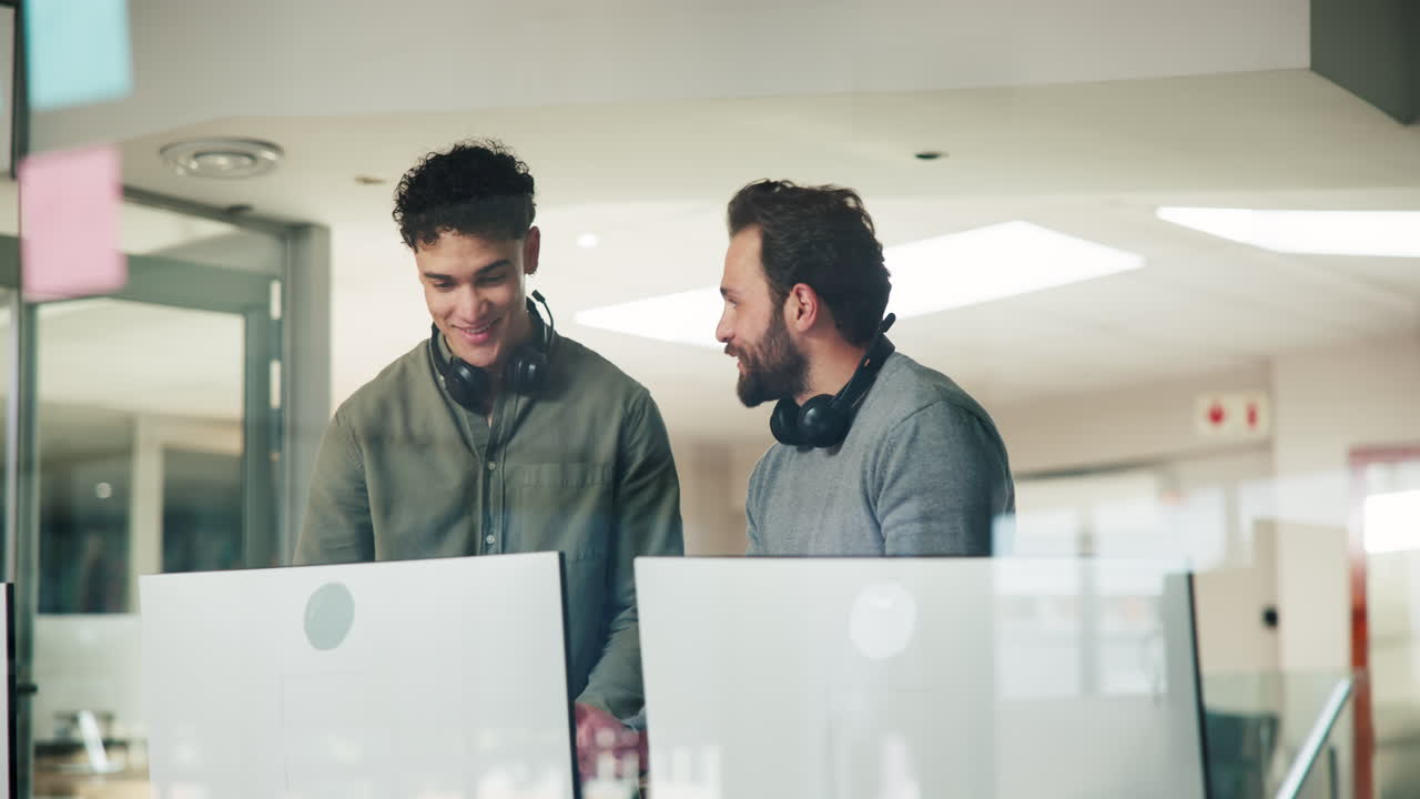 Two Men Celebrating Success in the Office