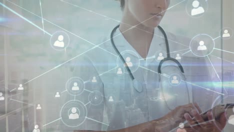 Animation-of-network-of-connections-over-caucasian-female-doctor-using-tablet-in-hospital