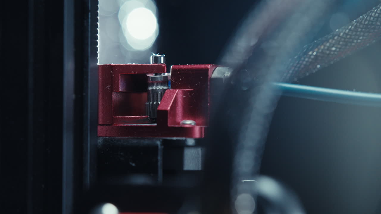 Close-up of a 3D printer extruder
