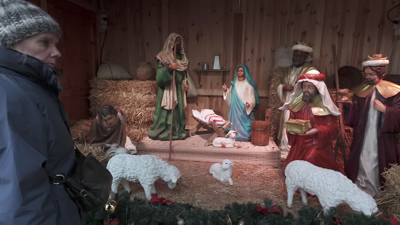 Woman views large nativity scene re-creation in Budapest, Hungary