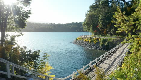 aerial - bridge over correntoso river, villa la angostura, neuquen, argentina, forward