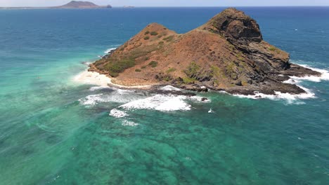 aerial footage of a fly-over of the mokulua islands