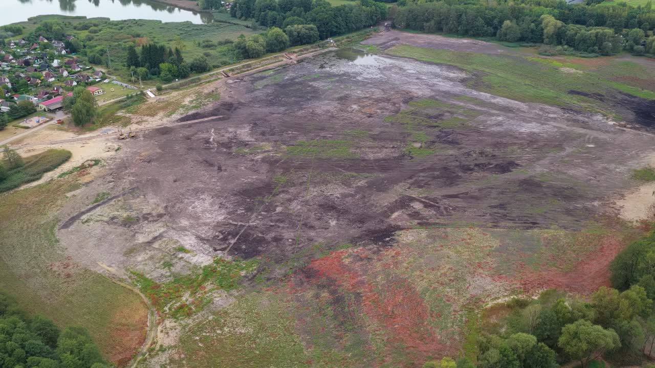 The waterless Frog Pond is undergoing mud dredging. Drone view of extensive ecosystem restoration