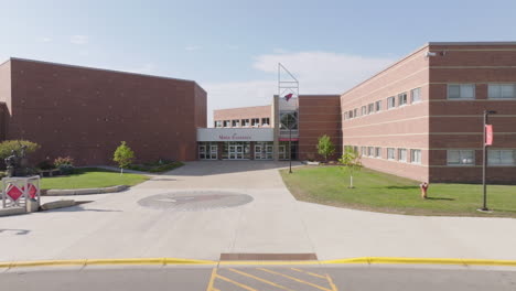 aerial view capturing the front entrance of an american high school building