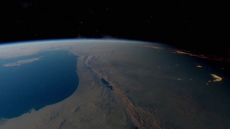 Medio-Oriente-Desde-El-Video-Del-Espacio-Exterior-Con-Luces-De-La-Ciudad-Moviéndose-Hacia-La-Oscuridad-Desde-Una-órbita-Alta