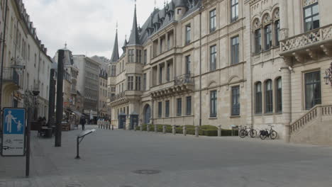 Pan-from-monumental-building-to-small-street-in-Luxembourg-city