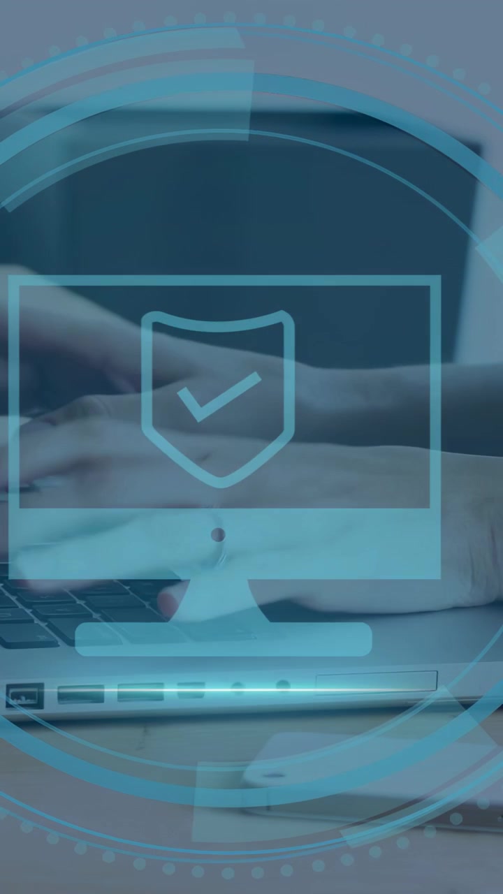 Vertical video: Woman's hands typing on laptop, starting security HUD and confirming system safety