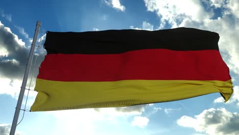 germany flag waving in the wind, blue sky background. 4k