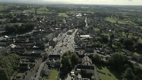 An-aerial-view-of-the-Yorkshire-town-of-Leyburn-on-a-sunny-summer-morning,-England,-UK