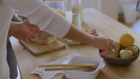 Closeup-of-Caucasian-couple-recording-video-for-cooking-vlog.