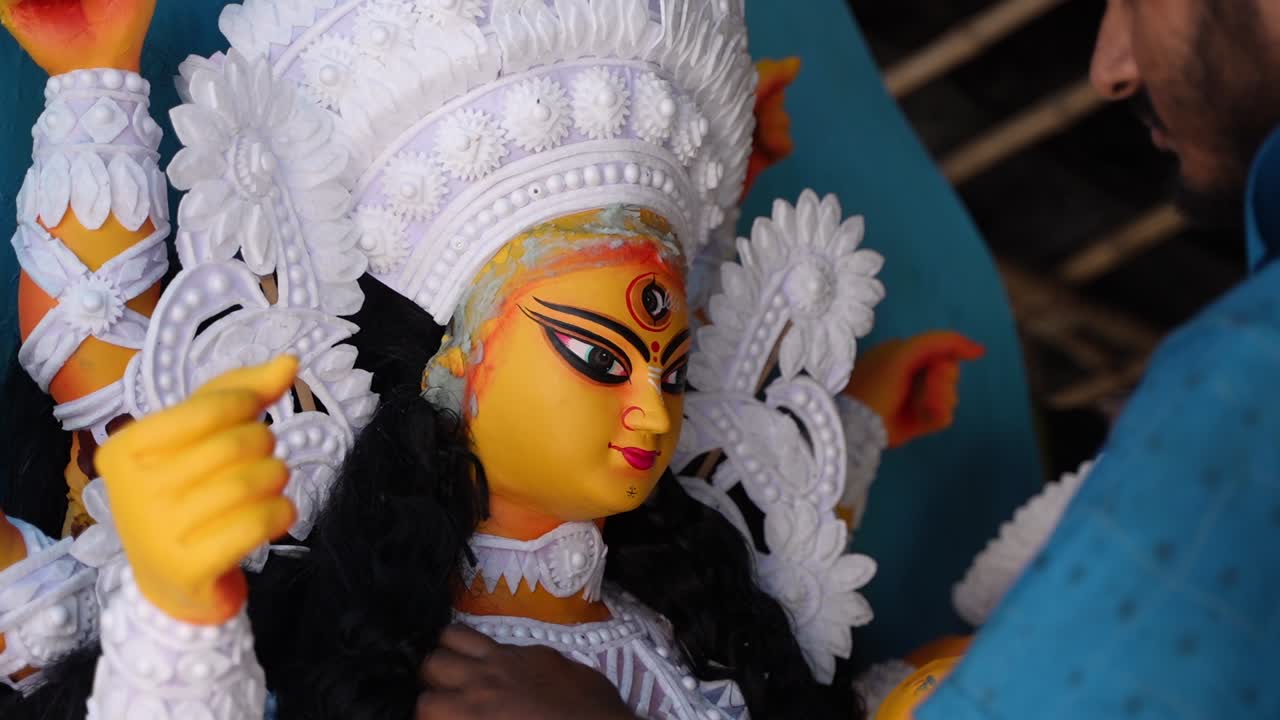 In Kumortuli, idol artists are making idols of Durga, the revered deity of Hinduism. The work of making these idols starts from June and these potters make many idols till November.