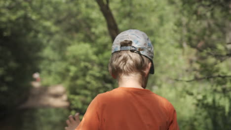 boy hiking in the woods