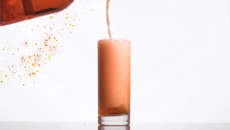 animation of confetti falling over drink on white background