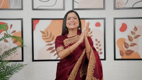 Happy-Indian-woman-clapping-and-celebrating