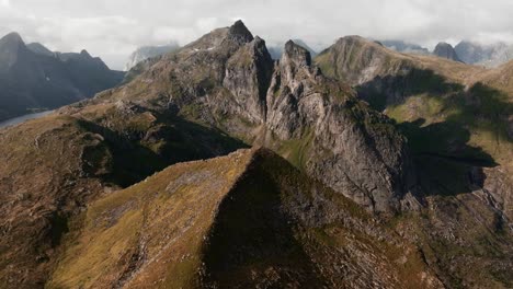 Aerial-view-of-Segla-mountain-above-the-sky,-Norway-during-summer