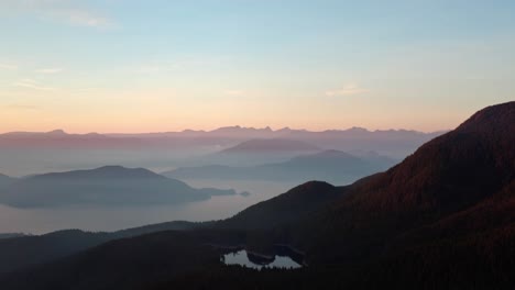 aerial view of hazy sunset glow in mountain range