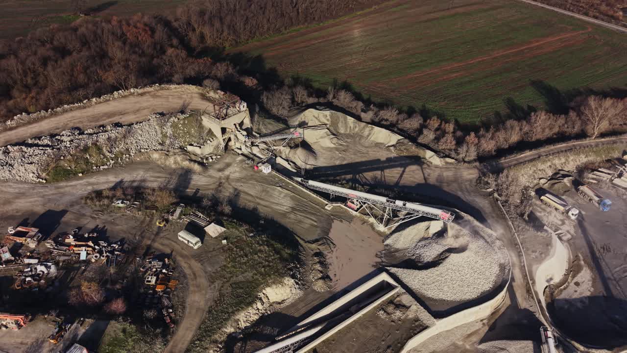 Quarry operation showing extraction and processing of stone materials