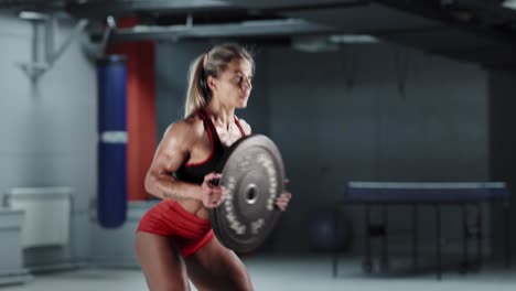 woman weightlifting in gym