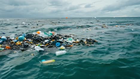 ocean pollution: a pile of plastic waste in the sea