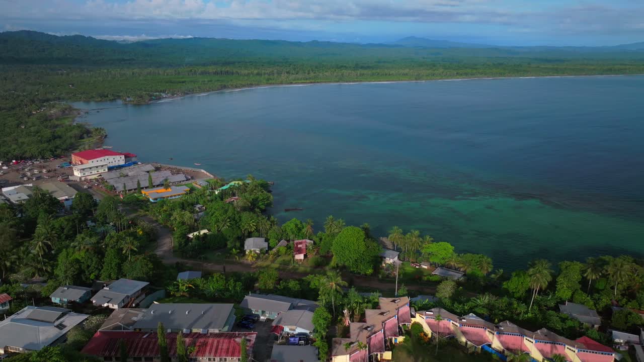 Wewak Hill Papua New Guinea PNG East Sepik Region Province Wewak costal town Dogreto Bay aerial drone Sundaun Market Boram road Bismarck Sea summer sunny morning dry season circle left motion