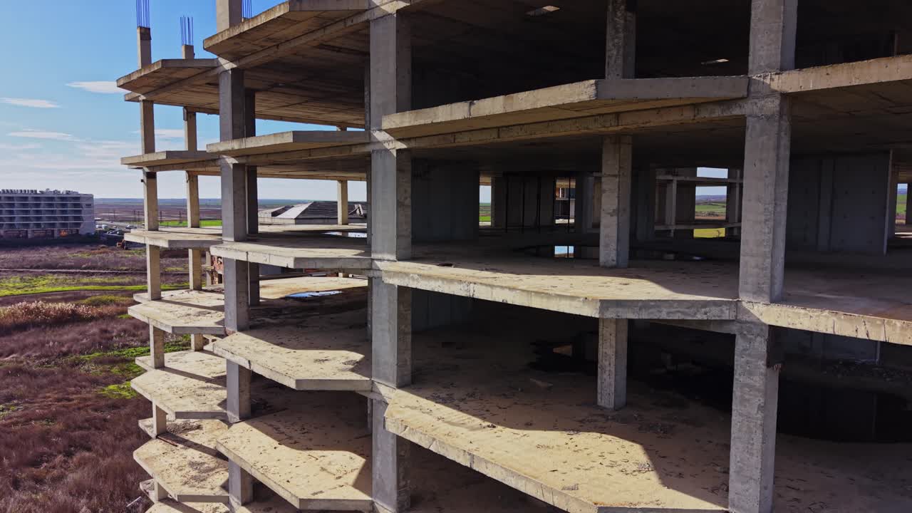 Urban construction site viewed from above with concrete framework