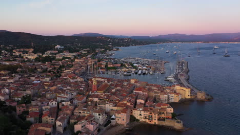 Early-morning-over-Saint-Tropez-city-aerial-harbor-luxury-destination