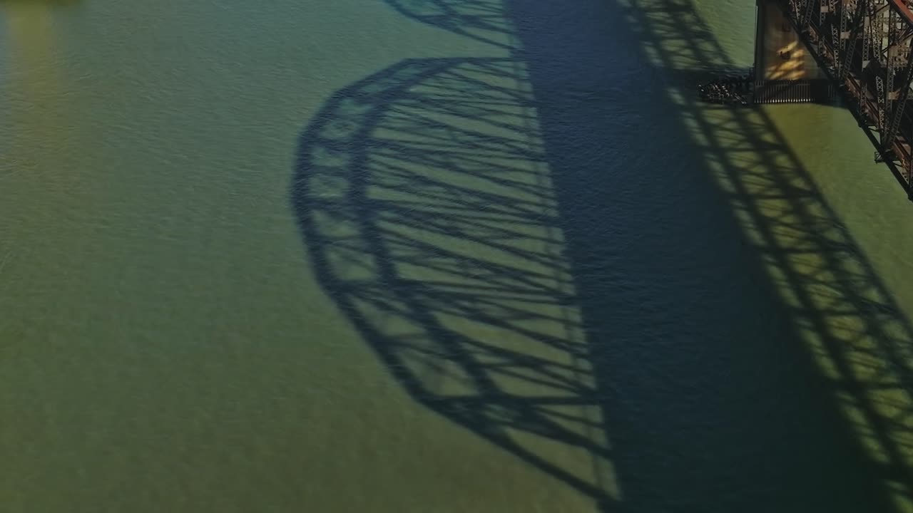 View of bridge and water in California from above near highway