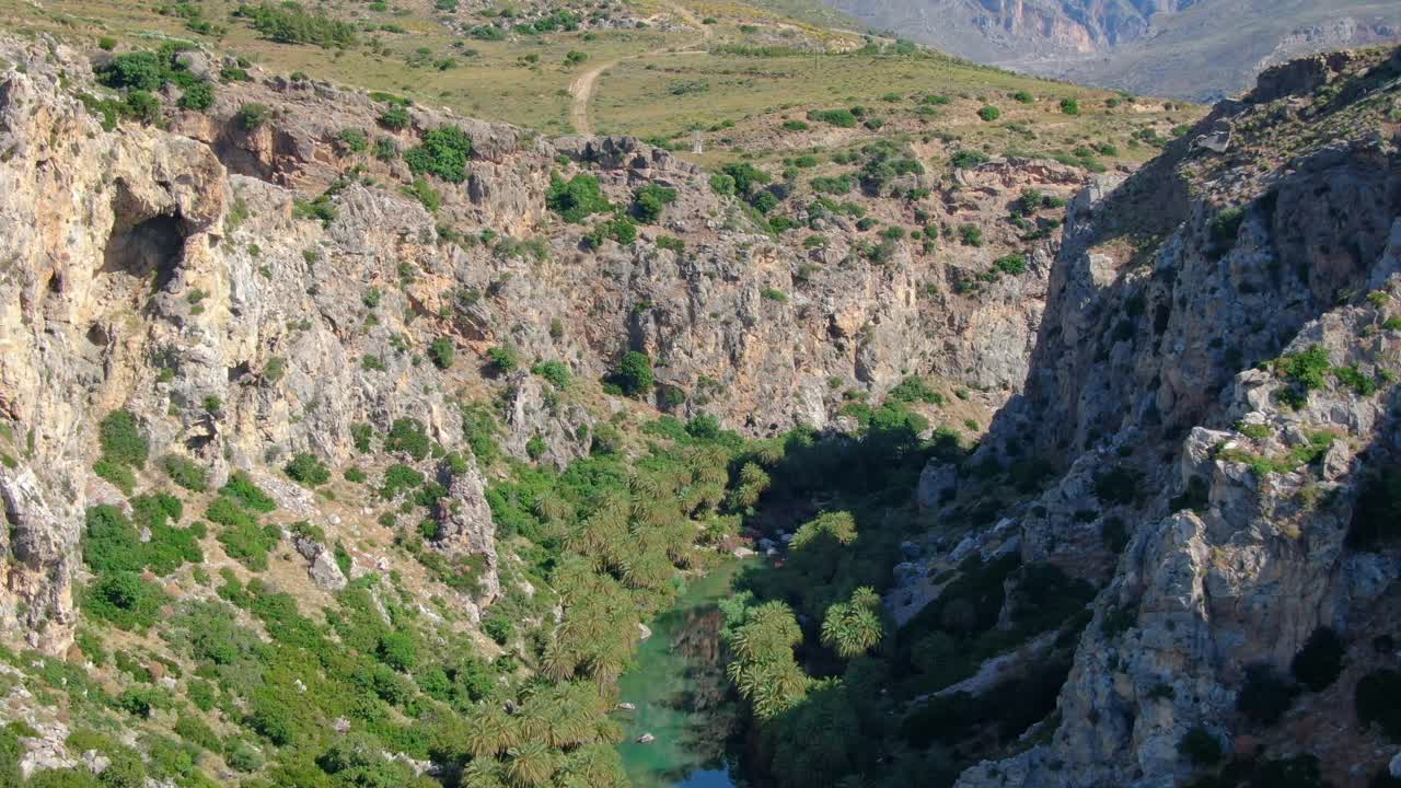 Premium stock video - Aerial flying through a gorge over kourtaliotis ...