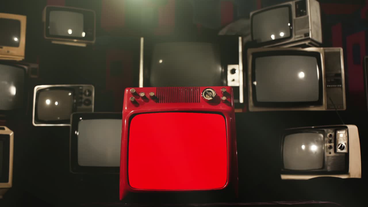 은 스크린과 많은 레트로 tv가 배경에서 나타납니다.