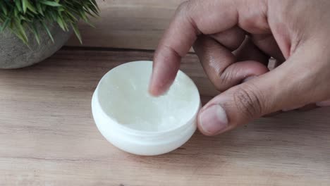 applying lip balm