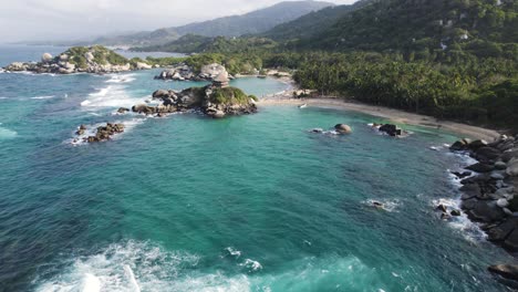 Tayrona's-Cabo-San-Juan-vista:-azure-waters-and-idyllic-landscape---aerial-flyover