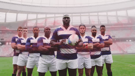 Animation-of-male-rugby-players-holding-ball-at-stadium