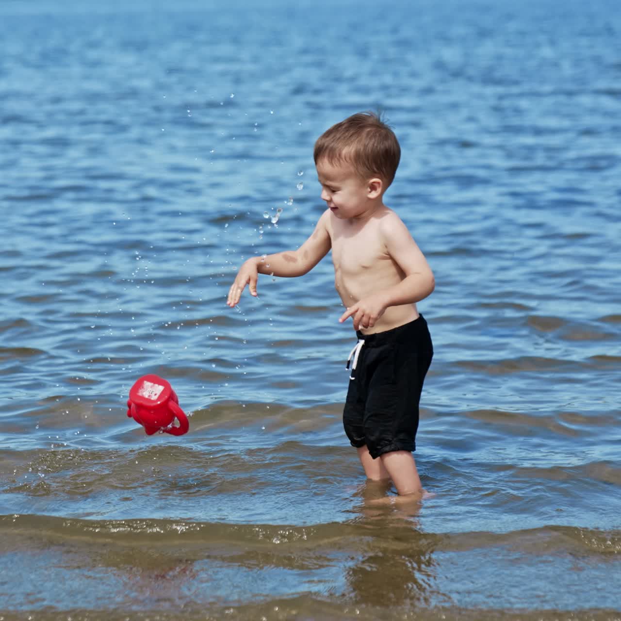Water summertime lifestyle. Summer child having fun on a river