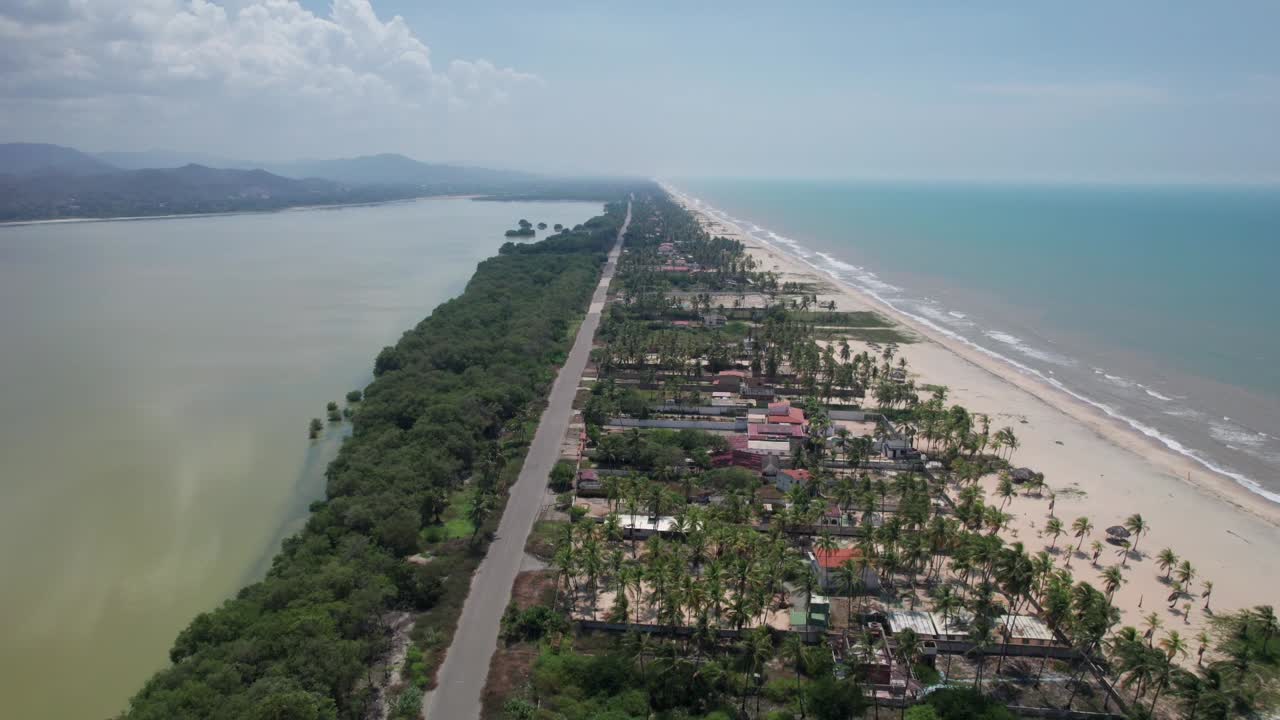 Narrow Peninsula with Beach, Road, and Houses in Coastal Anzoátegui
